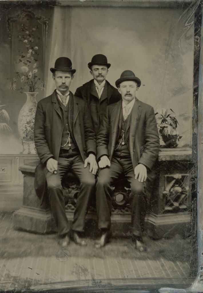 antique tintype of three men in suits