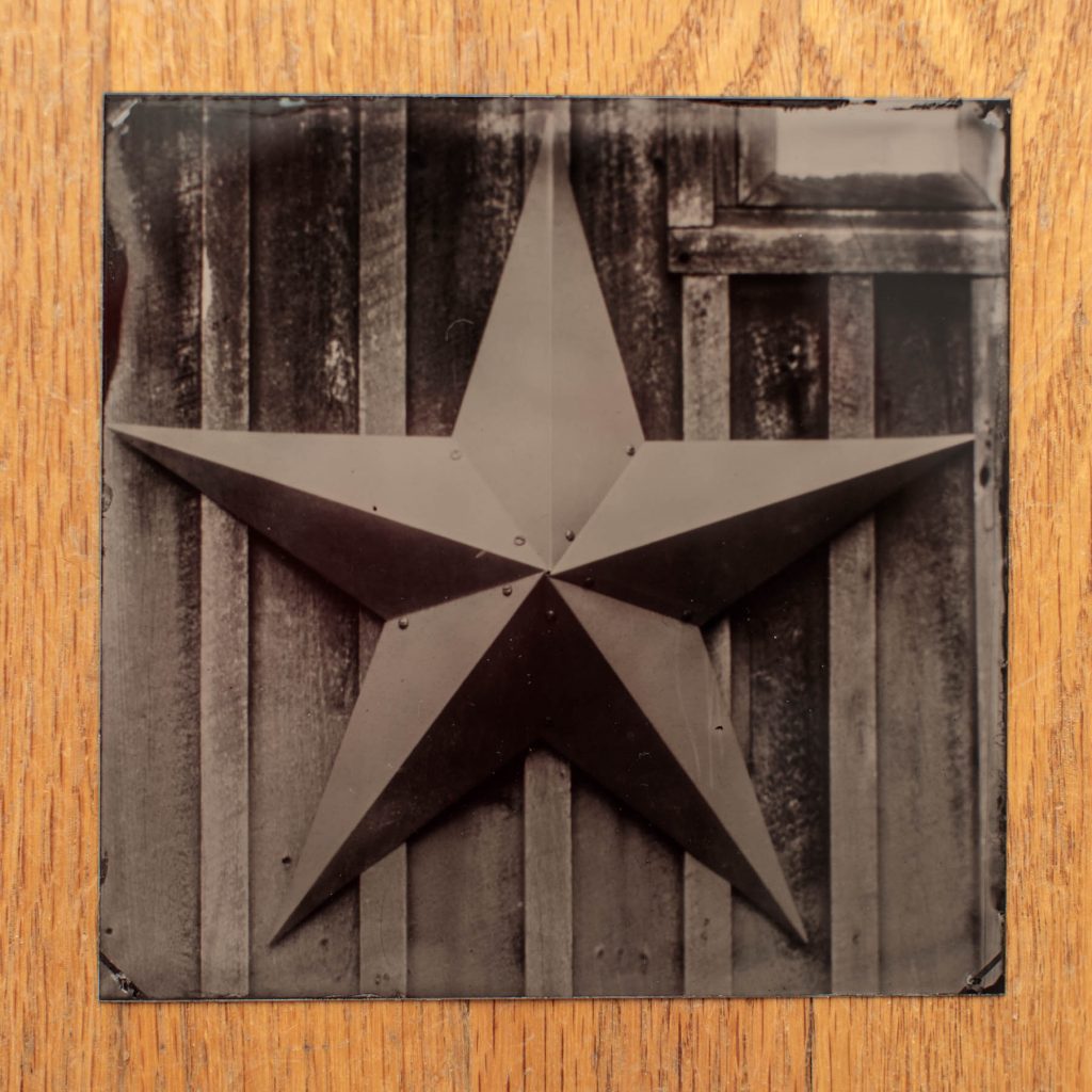 tintype of metal art star