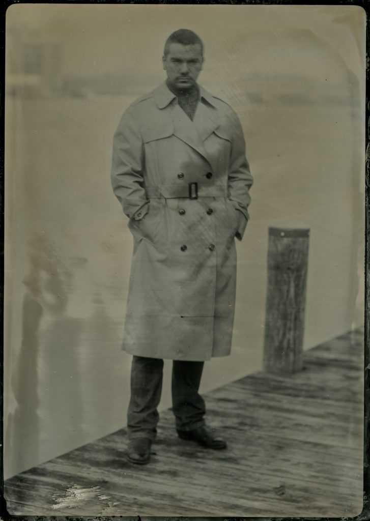 male model tintype portrait in a trench coat
