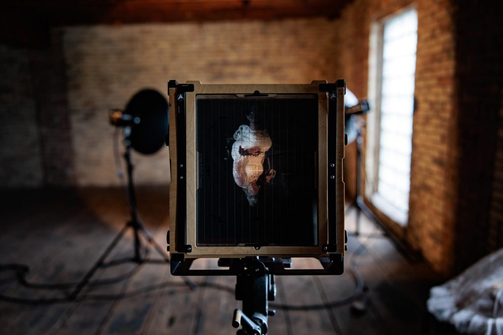 bride portrait view from back of large format camera