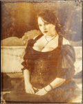 Victorian glass orotone print of a goth model goth model in a black dress