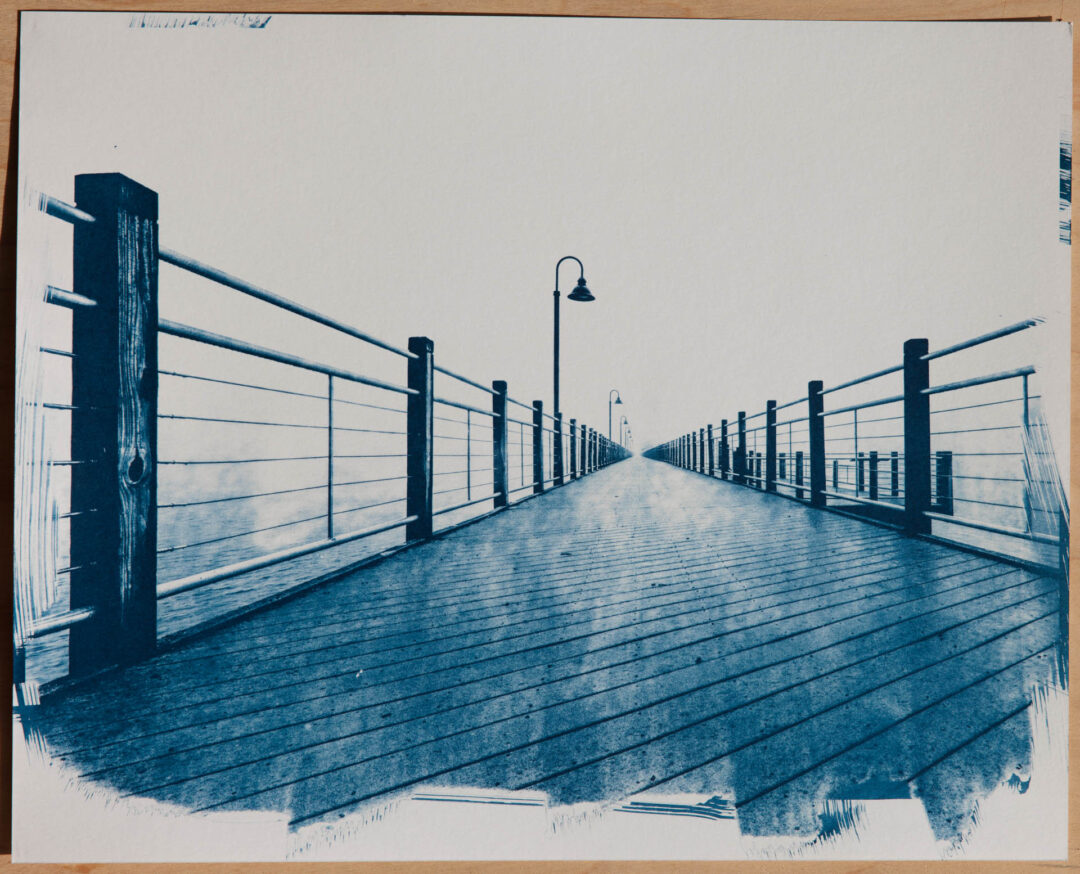 cyanotype of a bridge in the fog