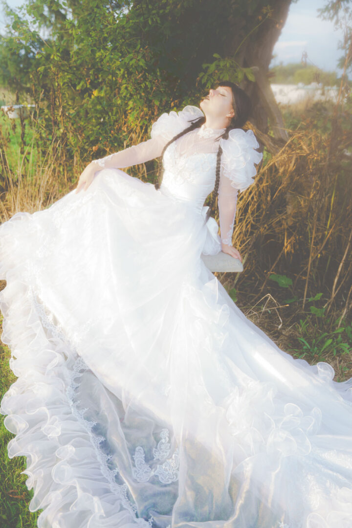 Halloween model in a white dress