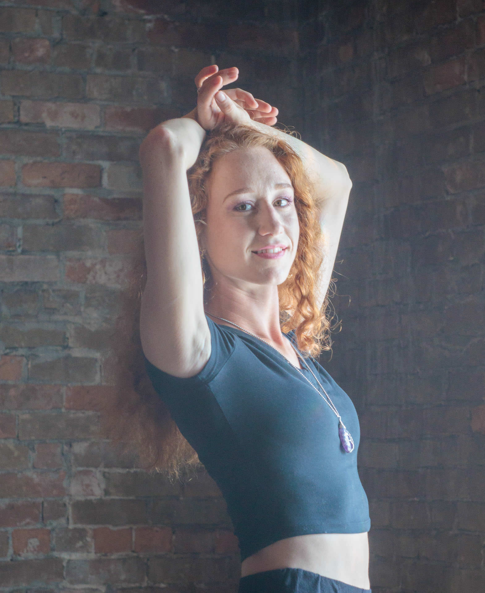 woman in black posing for Helios 44 lens portrait