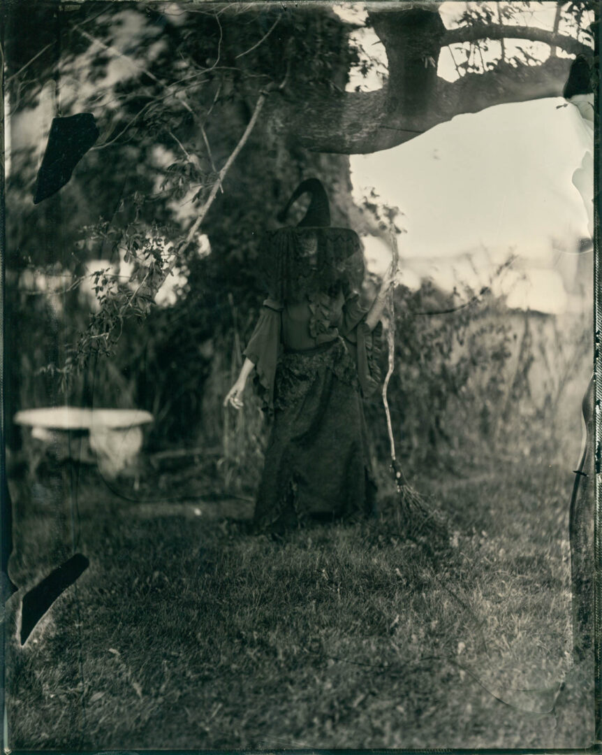 8x10 tintype of a woman in a spooky black dress
