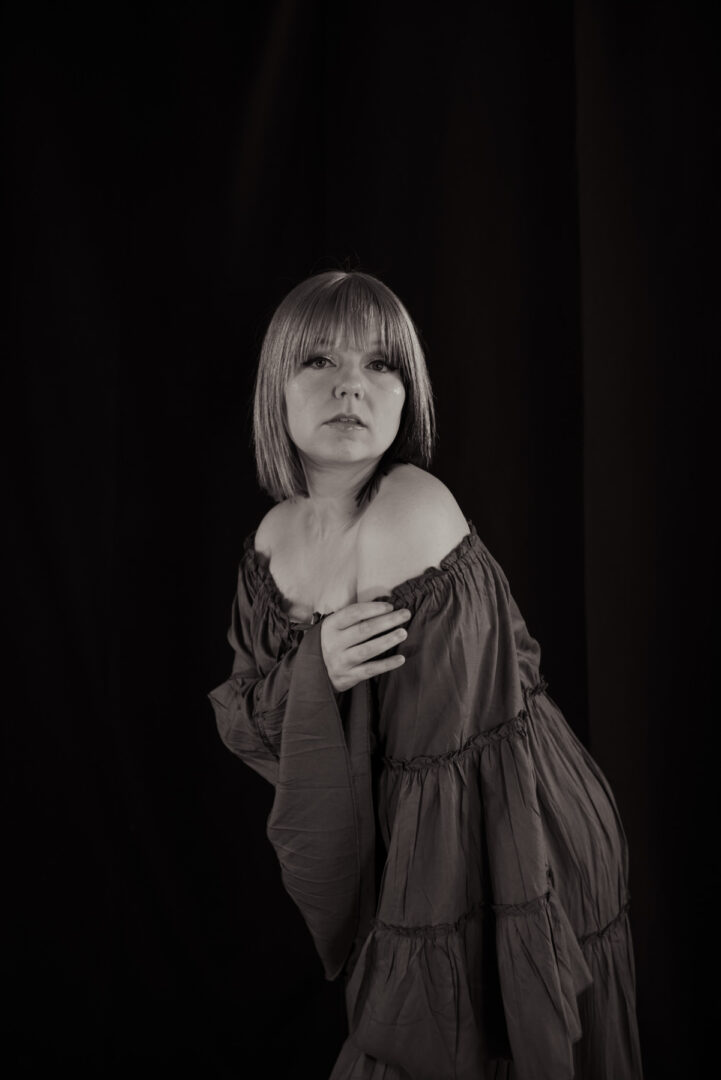 Portrait of woman in dress black and white