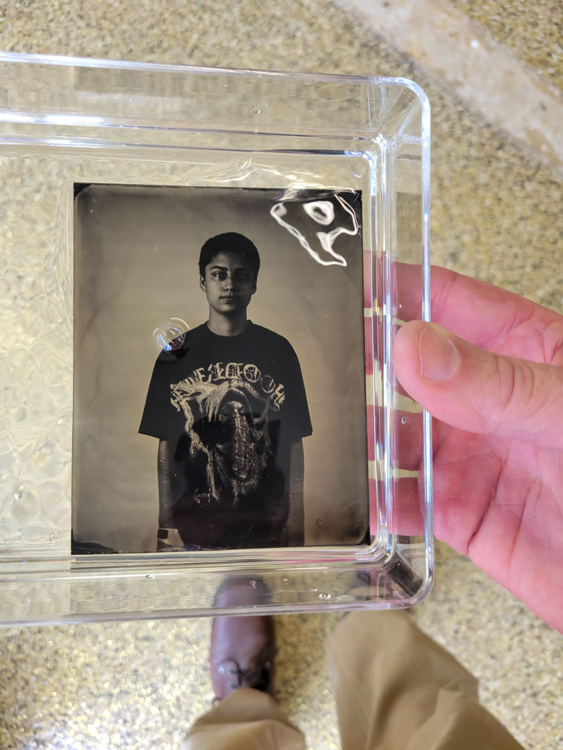 tintype being washed